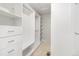 Walk-in closet with an array of shelves and drawers, offering plenty of storage at 9757 Ash Ln, Thornton, CO 80229