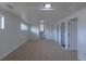 Unfinished basement offers a blank canvas with recessed lighting, carpet, and multiple entryways at 6013 W 62Nd Ave, Arvada, CO 80033