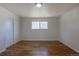 Spacious bedroom with sliding door closet and hardwood floors at 6013 W 62Nd Ave, Arvada, CO 80033