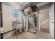 Basement utility area with stainless steel sink and updated water heater and HVAC system at 27891 Columbine Rd, Evergreen, CO 80439
