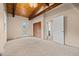 Spacious primary bedroom with walk-in closet and en-suite bathroom at 27891 Columbine Rd, Evergreen, CO 80439