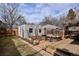 Large backyard with patio, deck, and a detached studio at 351 S Corona St, Denver, CO 80209