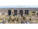 Distant aerial shot of complex featuring park views and a skyline backdrop at 460 S Marion Pkwy # 1106, Denver, CO 80209