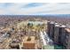 Scenic aerial view of community featuring lake, trees and city view at 460 S Marion Pkwy # 1106, Denver, CO 80209