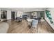 Dining room featuring wood flooring, neutral paint and comfortable seating at 460 S Marion Pkwy # 1106, Denver, CO 80209