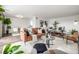 This open-concept living space features sleek hardwood floors, modern decor, and ample seating at 460 S Marion Pkwy # 1106, Denver, CO 80209