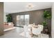 Open-concept room featuring dining table set near sliding glass doors to a balcony and living room at 460 S Marion Pkwy # 1106, Denver, CO 80209