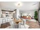 Open-concept living space with the dining area, kitchen, and living room showcased at 460 S Marion Pkwy # 1106, Denver, CO 80209