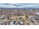 Expansive aerial view of the community showcasing mature trees, a park, and the skyline at 3640 York St, Denver, CO 80205