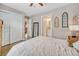 Well-lit bedroom showcasing closet, door, and neutral decor at 3640 York St, Denver, CO 80205