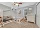 Bedroom with gray walls, carpeted floors, open concept bed-couch, and a dresser in view at 3640 York St, Denver, CO 80205