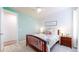 Light-filled bedroom with a white accent wall and a cozy queen-size bed at 5932 Eldora St, Golden, CO 80403