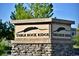 Elegant community entrance sign reading 'Table Rock Ridge', set against a bright blue sky at 5932 Eldora St, Golden, CO 80403