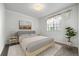 Comfortable bedroom with large windows and neutral decor at 31819 Rocky Village Dr # 301, Evergreen, CO 80439