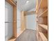 Spacious walk-in closet with custom shelving and ample storage for an organized wardrobe at 31819 Rocky Village Dr # 301, Evergreen, CO 80439