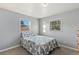 Cozy bedroom featuring a double bed, two windows, and neutral color palette, creating a relaxing atmosphere at 1085 Victor St, Aurora, CO 80011