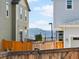 The backyard features mountain views and a wood fence at 13754 Ash Cir, Thornton, CO 80602