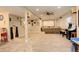 Large finished basement featuring a home theater setup and a casual entertainment area at 15122 Fillmore Way, Thornton, CO 80602