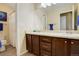 Well-lit bathroom with a double sink vanity, perfect for getting ready in the morning at 15122 Fillmore Way, Thornton, CO 80602