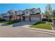 Charming two-story home featuring a well-kept lawn and three-car garage, ideal for families at 15122 Fillmore Way, Thornton, CO 80602