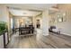 Open-concept area offers a dining space and a relaxed seating area for lounging and easy conversation at 15122 Fillmore Way, Thornton, CO 80602