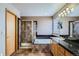 Bright bathroom featuring a tub, shower, double sink vanity and natural light at 15901 W 66Th Pl, Arvada, CO 80007