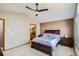 Comfortable main bedroom features a cozy feel, natural light and soft carpet at 15901 W 66Th Pl, Arvada, CO 80007