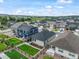 An aerial view shows the back yards of the neighborhood homes all fenced in with well kept lawns at 2130 Indian Balsam Dr, Monument, CO 80132