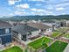Aerial view of neighborhood homes with landscaped backyards and gorgeous mountain views at 2130 Indian Balsam Dr, Monument, CO 80132