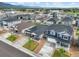 An aerial view reveals a well-planned neighborhood with tree-lined streets and manicured lawns at 2130 Indian Balsam Dr, Monument, CO 80132
