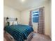 Comfortable bedroom with a soft bed, window with nice curtains, and carpeted floor at 2130 Indian Balsam Dr, Monument, CO 80132