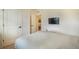 Bright bedroom featuring a cozy bed and views of backyard from the window at 2130 Indian Balsam Dr, Monument, CO 80132
