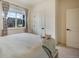 Bright bedroom with a large window offering views of the neighborhood at 2130 Indian Balsam Dr, Monument, CO 80132