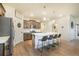 Bright kitchen with a large island, stainless steel appliances, and plenty of seating at 2130 Indian Balsam Dr, Monument, CO 80132