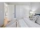 Bedroom features a large closet and a neutral color palette at 639 25Th St, Denver, CO 80205