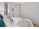 Comfortable bedroom showcasing natural light, and soft decor at 639 25Th St, Denver, CO 80205