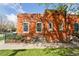 Cozy brick house exterior with manicured lawn and a garden at 639 25Th St, Denver, CO 80205