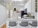 Charming kitchen with white countertops, stainless steel appliances, and an open layout at 639 25Th St, Denver, CO 80205