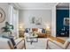 Beautifully furnished living room with hardwood floors and natural light at 639 25Th St, Denver, CO 80205