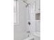Clean, bright tiled shower with dual showerheads and updated fixtures at 639 25Th St, Denver, CO 80205