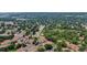 Bird's eye view of townhouses circled, with mature trees and green space in the neighborhood at 8406 Everett Way # C, Arvada, CO 80005