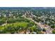 Scenic aerial view of the neighborhood showcasing the mature trees and green spaces surrounding the property at 8406 Everett Way # C, Arvada, CO 80005