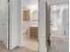 Bathroom with wood vanity, and a linoleum floor at 8406 Everett Way # C, Arvada, CO 80005