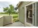 This home features a private patio with an open slider that provides views of the outdoors at 8406 Everett Way # C, Arvada, CO 80005