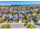 Aerial view of a suburban neighborhood featuring colorful trees and well-maintained homes at 1462 Hyacinth Way, Superior, CO 80027
