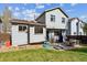 Charming backyard with patio seating, grassy area, and privacy fence, perfect for outdoor enjoyment at 1462 Hyacinth Way, Superior, CO 80027