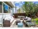 Cozy backyard patio with comfortable seating and a fenced yard at 1462 Hyacinth Way, Superior, CO 80027