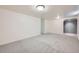 Spacious basement featuring neutral carpet, recessed lighting, and painted walls, ready for customization at 13472 E Dakota Ave, Aurora, CO 80012
