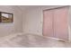 Bedroom featuring a window with pleated blinds at 309 Pheasant Run, Louisville, CO 80027