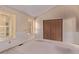 Inviting bedroom featuring neutral walls, carpet flooring, and a closet at 309 Pheasant Run, Louisville, CO 80027